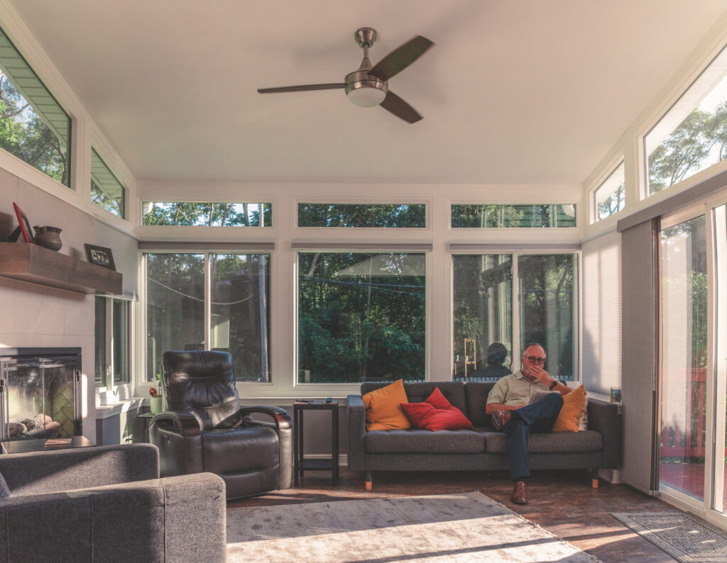 Bright custom glass sunroom interior built by Serene Sunrooms