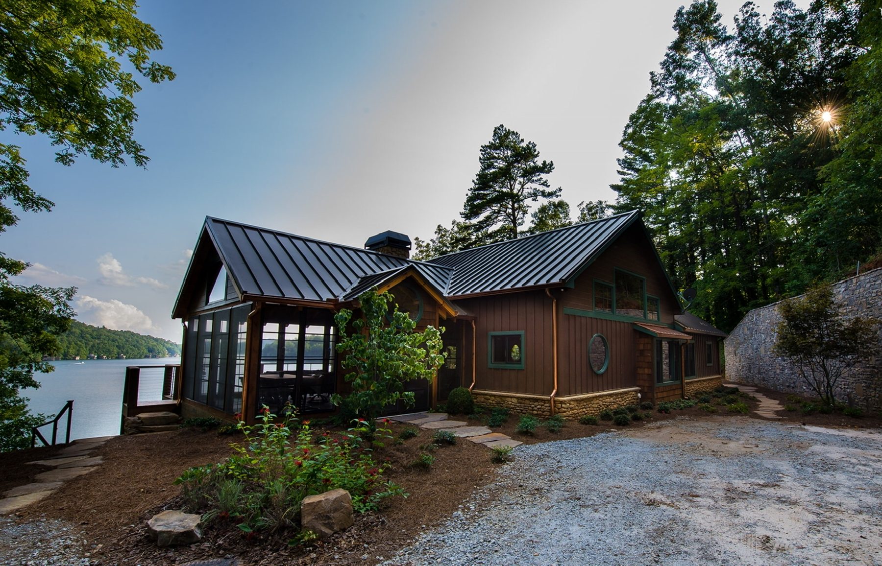 Lakeside home with a screened three-season room
