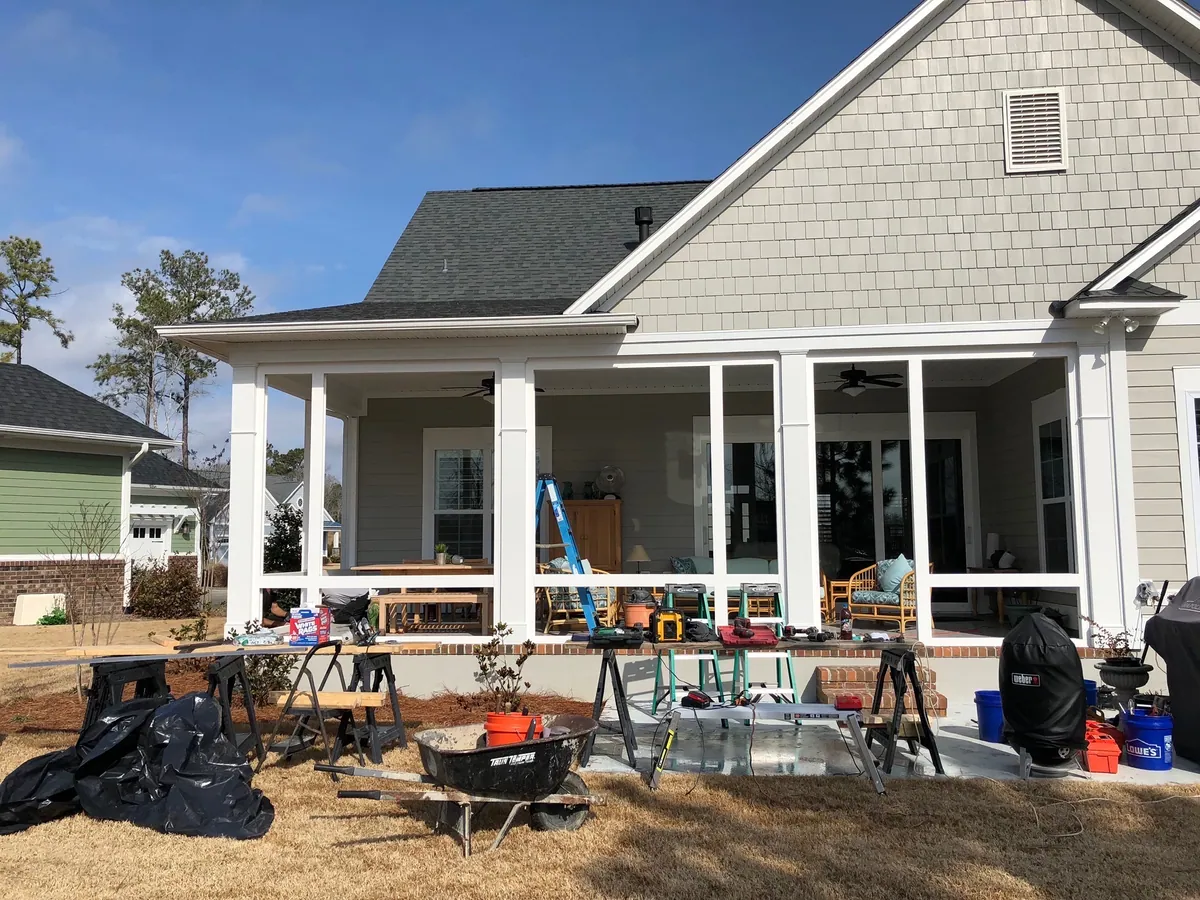 Finishing work under a completed roofline