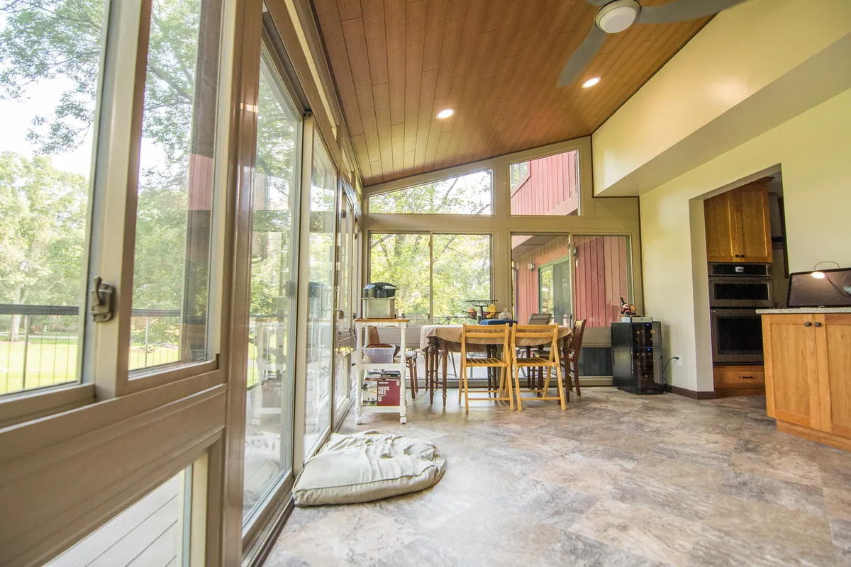 Sunroom opening directly into the kitchen