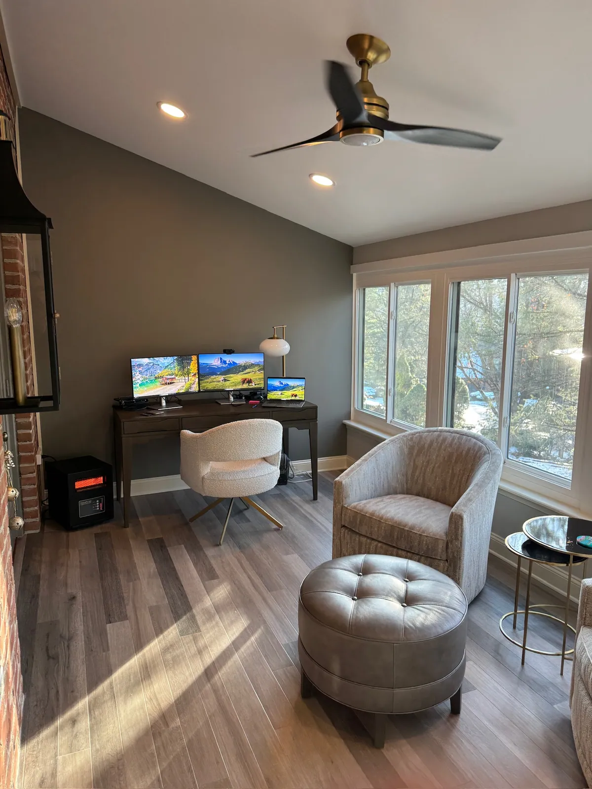 Compact sunroom with a desk and armchair