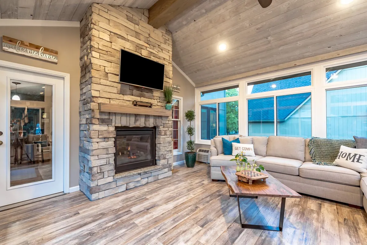 Stone fireplace wall in a four-season room