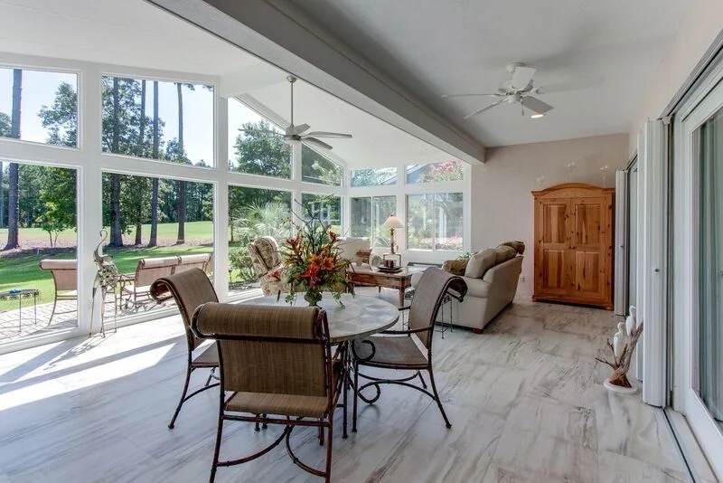 Dining set inside a glass-walled room