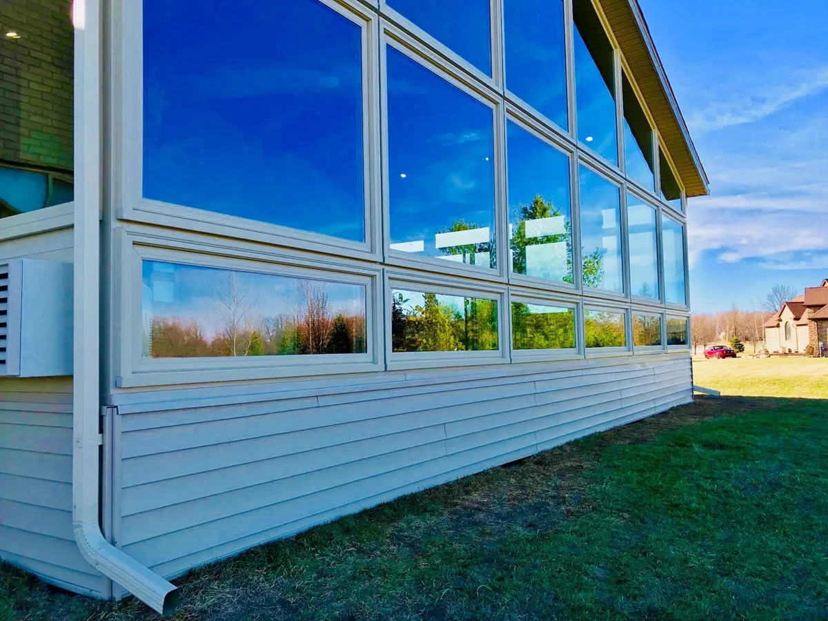 Glass-walled porch enclosure