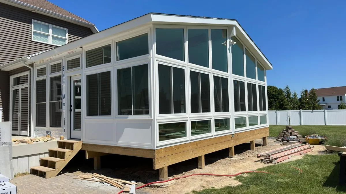 Grey sunroom with patio